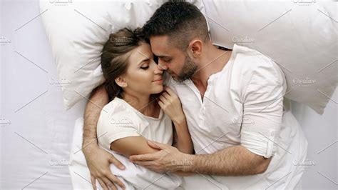 kissing in bed videos|Smiling Young Couple Hugging and Kissing in Bed .